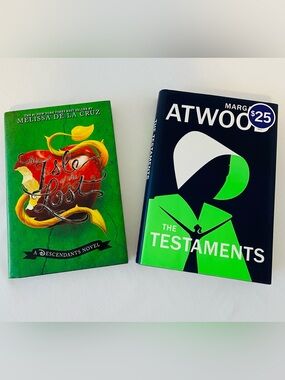The Testaments by Atwood + The Isle of the Lost by Melissa De La Cruz